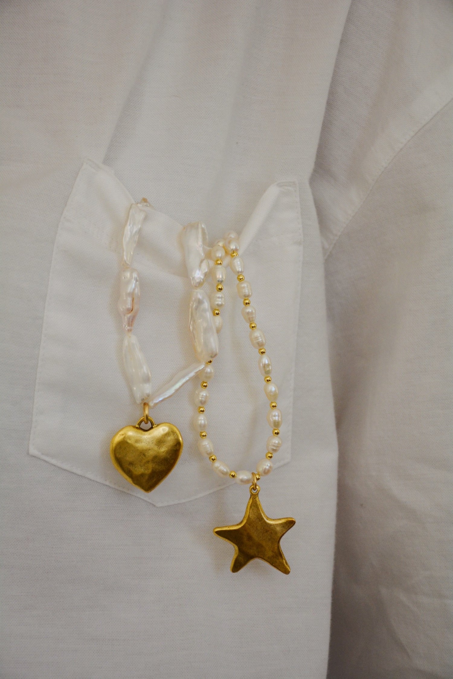 The Pearl Star Charm