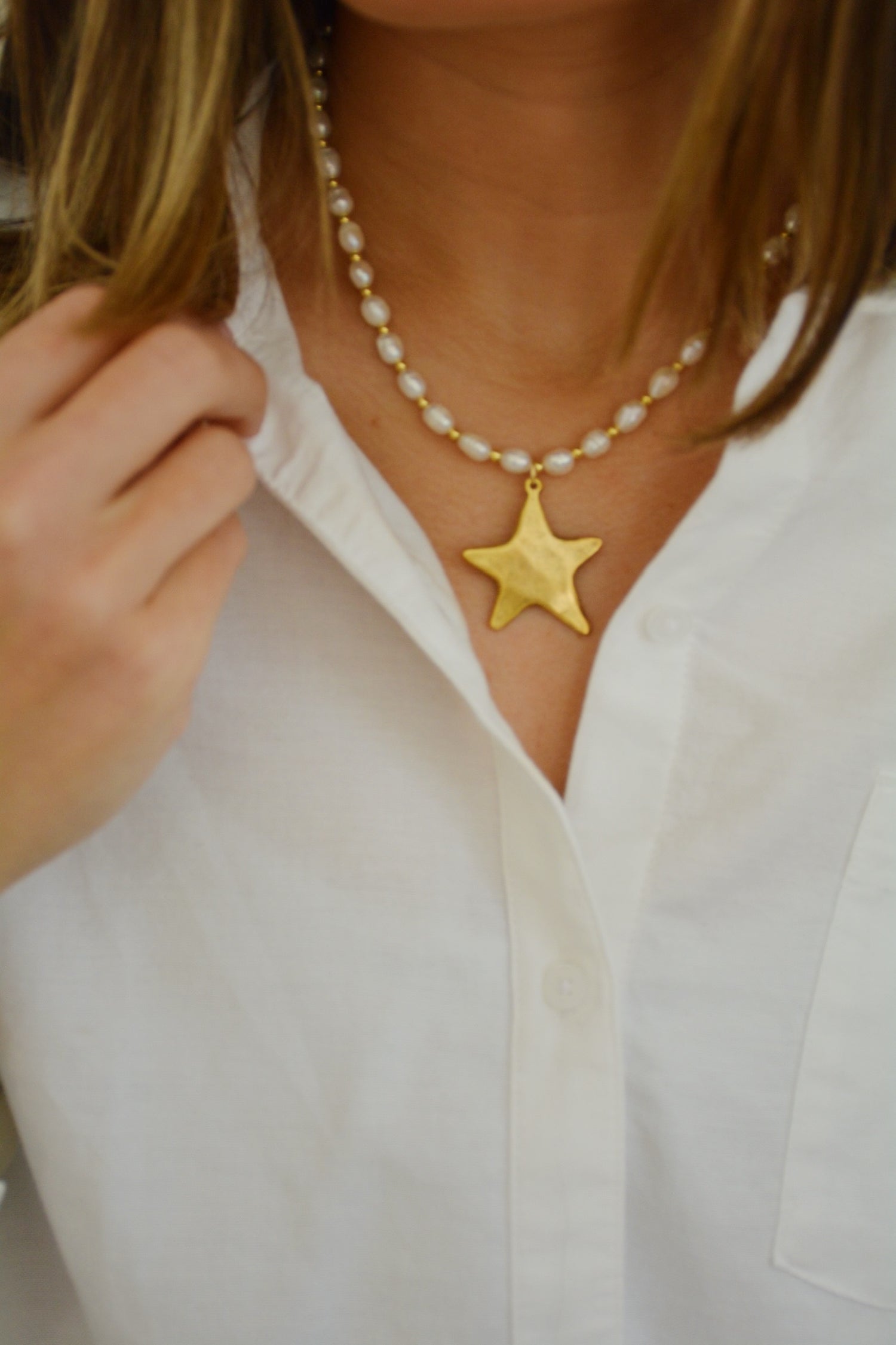 The Pearl Star Charm